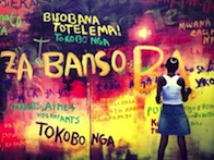 A girl decorating the Day Care Centre's door